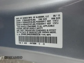 2014 Honda Odyssey EX-L with VIN 5FNRL5H62EB003236, listed as a Copart auction lot 63342255 with 147,398 mi miles and Salvage title. Bid and sale history available at DreamBid. Image 13.