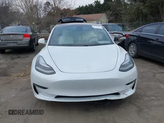 2018 Tesla Model 3 Long Range Battery with VIN 5YJ3E1EB4JF086012, listed as a IAAI auction lot 41683859 with 52,059 mi miles and . Bid and sale history available at DreamBid. Image 12.