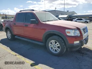 2010 Ford Explorer Sport Trac XLT z VIN 1FMEU3BE8AUA29286, wystawiony jako Copart lot #51973415 z przebiegiem 151 691 mil mil oraz Szkody całkowita. Historia ofert i sprzedaży dostępna na DreamBid. Obrazek 4.