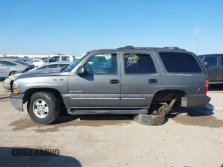 2002 Chevrolet Tahoe LT with VIN 1GNEC13Z12J233208, listed as a IAAI auction lot 41659873 with 238,922 mi miles and . Bid and sale history available at DreamBid. Image 14.