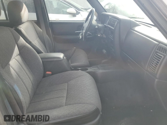 2001 Jeep Cherokee Sport z VIN 1J4FF58SX1L576572, wystawiony jako Copart lot #48982965 z przebiegiem 174 500 mil mil oraz Szkoda całkowita • Salvage title. Historia ofert i sprzedaży dostępna na DreamBid. Obrazek 7.