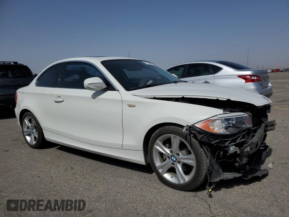 2013 BMW 1 Series 128i with VIN WBAUP7C50DVX52011, listed as a Copart auction lot 71388914 with 51,081 mi miles and Salvage Title. Bid and sale history available at carsss.com. Image 4.
