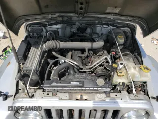 2004 Jeep Wrangler Sport with VIN 1J4FA49S44P788467, listed as a Copart auction lot 55395625 with 187,289 mi miles and Salvage title. Bid and sale history available at DreamBid. Image 11.