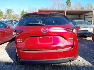 2020 Mazda CX-5 Grand Touring with VIN JM3KFADM8L0846818, listed as a IAAI auction lot 41224843 with 123,554 mi miles. Bid and sale history available at carsss.com. Image 17.