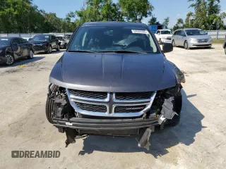 2017 Dodge Journey SE with VIN 3C4PDCAB6HT621987, listed as a Copart auction lot 52559305 with 169,468 mi miles and Salvage Title. Bid and sale history available at DreamBid. Image 5.