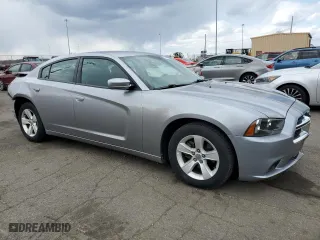 2013 Dodge Charger SE with VIN 2C3CDXBG4DH737535, listed as a Copart auction lot 50473165 with 103,204 mi miles and Salvage Title. Bid and sale history available at carsss.com. Image 4.