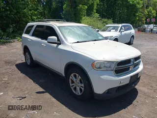 2012 Dodge Durango SXT z VIN 1C4RDJAG1CC122253, wystawiony jako IAAI lot #42320793 z przebiegiem 128 931 mil mil oraz . Historia ofert i sprzedaży dostępna na DreamBid. Obrazek 1.