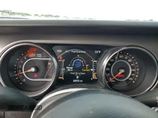 2023 Jeep Wrangler Sport S with VIN 1C4HJXDNXPW569699, listed as a Copart auction lot 52392145 with 32,972 mi miles and Salvage title. Bid and sale history available at DreamBid. Image 9.