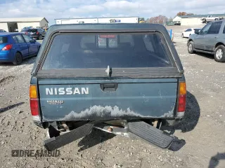 1994 Nissan Frontier with VIN 1N6SD11S4RC405080, listed as a Copart auction lot 82565904 with 154,400 mi miles and Salvage title. Bid and sale history available at DreamBid. Image 6.
