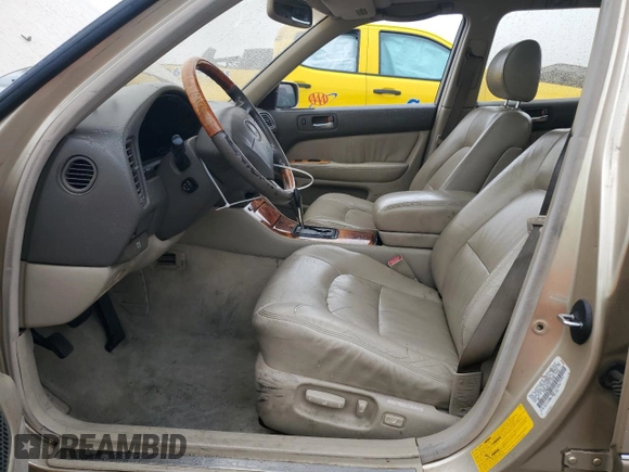 2000 Lexus LS 400 z VIN JT8BH28F2Y0180338, wystawiony jako Copart lot #46099195 z przebiegiem 241 041 mil mil oraz Szkoda całkowita • Salvage title. Historia ofert i sprzedaży dostępna na DreamBid. Obrazek 7.