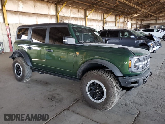 2023 Ford Bronco with VIN 1FMEE5DP9PLB29838, listed as a Copart auction lot 62409785 with 11,124 mi miles and Salvage title. Bid and sale history available at DreamBid. Image 4.