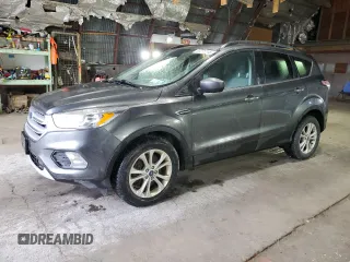 2018 Ford Escape SE z VIN 1FMCU9GD7JUA68705, wystawiony jako Copart lot #58275145 z przebiegiem 200 695 mil mil oraz Tytuł czysty. Historia ofert i sprzedaży dostępna na DreamBid. Obrazek 1.