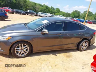 2016 Ford Fusion SE with VIN 3FA6P0HD8GR162875, listed as a IAAI auction lot 42434422 with 200,000 mi miles and . Bid and sale history available at DreamBid. Image 14.