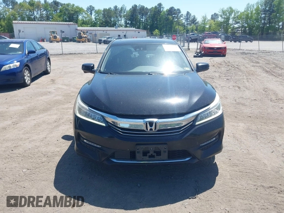2016 Honda Accord Touring with VIN 1HGCR3F93GA036152, listed as a IAAI auction lot 42134354 with 233,311 mi miles and . Bid and sale history available at DreamBid. Image 12.