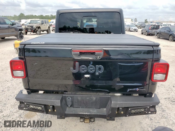 2023 Jeep Gladiator Freedom with VIN 1C6HJTAG7PL531273, listed as a Copart auction lot 56743255 with 41,226 mi miles and Salvage title. Bid and sale history available at DreamBid. Image 6.