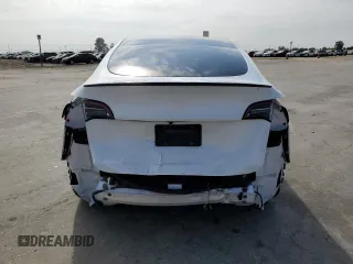 2022 Tesla Model Y Performance с VIN 7SAYGDEF4NF403784, выставлен на аукционе Copart как лот 53392595 с пробегом 51 023 миль миль и Списание • Salvage title. История ставок и продаж доступна на DreamBid. Изображение 6.