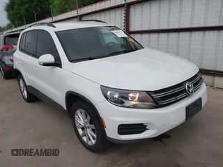 2015 Volkswagen Tiguan R-Line with VIN WVGAV7AX5FW585248, listed as a IAAI auction lot 41909618 with 137,448 mi miles and . Bid and sale history available at DreamBid. Image 1.