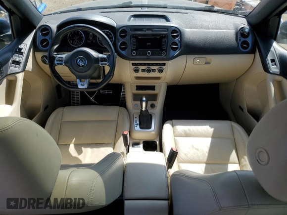2015 Volkswagen Tiguan SE with VIN WVGAV7AX2FW094359, listed as a Copart auction lot 60101885 with 106,305 mi miles and Salvage title. Bid and sale history available at DreamBid. Image 8.