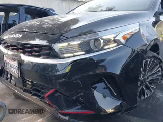 2023 Kia Forte GT-Line z VIN 3KPF54AD8PE539617, wystawiony jako IAAI lot #41890617 z przebiegiem 26 855 mil mil oraz . Historia ofert i sprzedaży dostępna na DreamBid. Obrazek 17.