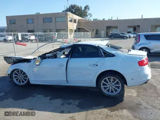 2015 Audi A4 Premium Plus with VIN WAUFFAFL3FN046415, listed as a IAAI auction lot 41993797 with 112,920 mi miles. Bid and sale history available at carsss.com. Image 14.