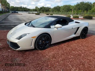 2012 Lamborghini Gallardo z VIN ZHWGU6BZ7CLA11933, wystawiony jako Copart lot #74679154 z przebiegiem Nie podano mil oraz Szkody całkowita. Historia ofert i sprzedaży dostępna na DreamBid. Obrazek 1.