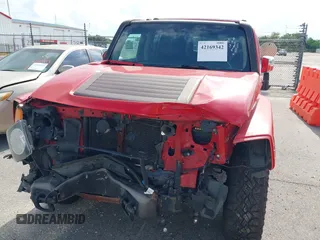 2007 Hummer H3 SUV with VIN 5GTDN13E678100639, listed as a IAAI auction lot 42169342 with 239,906 mi miles. Bid and sale history available at carsss.com. Image 6.