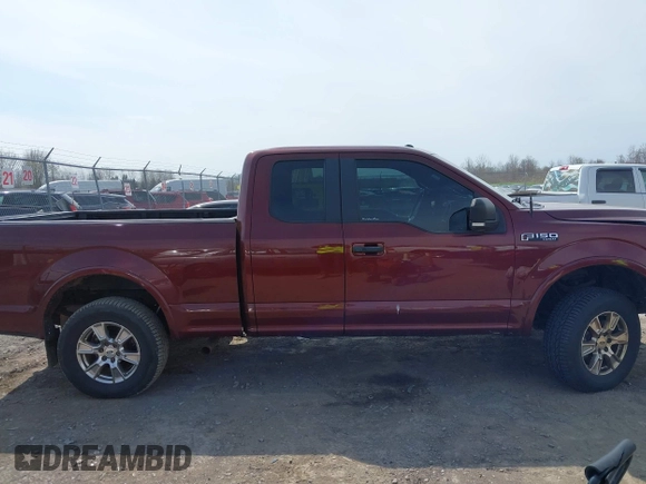 2015 Ford F-150 XLT with VIN 1FTFX1EF9FFA86164, listed as a IAAI auction lot 42112185 with 115,871 mi miles and . Bid and sale history available at DreamBid. Image 13.