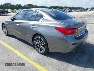 2015 Infiniti Q50 Premium z VIN JN1BV7AR3FM390743, wystawiony jako IAAI lot #41990093 z przebiegiem 91 350 mil mil oraz . Historia ofert i sprzedaży dostępna na DreamBid. Obrazek 3.