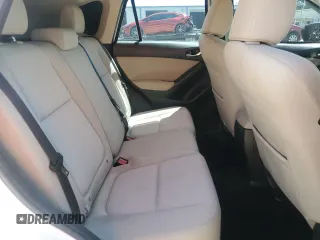 2013 Mazda CX-5 Sport with VIN JM3KE2BE4D0109296, listed as a Copart auction lot 55575555 with 130,112 mi miles and Salvage title. Bid and sale history available at DreamBid. Image 11.