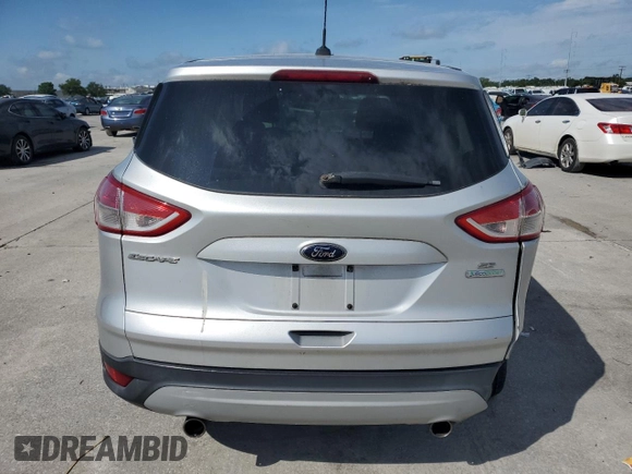 2013 Ford Escape SE с VIN 1FMCU0G9XDUA41798, выставлен на аукционе Copart как лот 57460025 с пробегом 137 816 миль миль и Списание • Salvage title. История ставок и продаж доступна на DreamBid. Изображение 6.