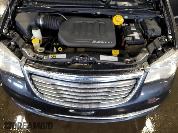 2013 Chrysler Town & Country Touring L with VIN 2C4RC1CG0DR785550, listed as a Copart auction lot 66027284 with 145,191 mi miles and Salvage Title. Bid and sale history available at DreamBid. Image 12.