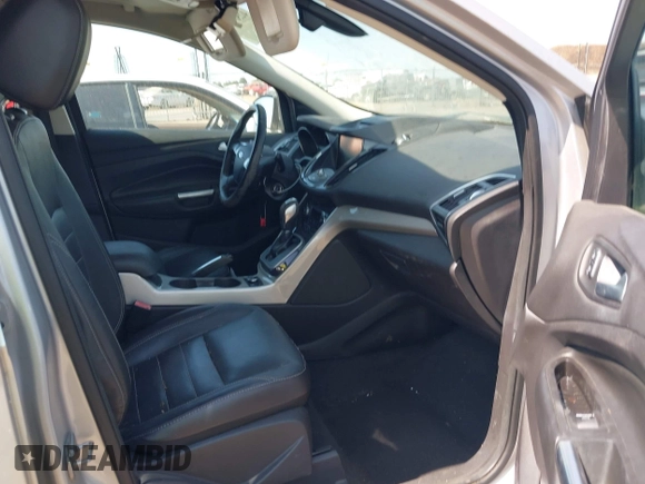 2013 Ford Escape SEL z VIN 1FMCU9H95DUC87631, wystawiony jako IAAI lot #42564756 z przebiegiem 144 467 mil mil oraz . Historia ofert i sprzedaży dostępna na DreamBid. Obrazek 5.