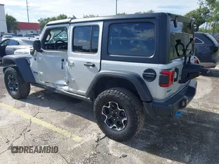 2023 Jeep Wrangler Rubicon with VIN 1C4JJXR63PW703424, listed as a IAAI auction lot 42639653 with 46,412 mi miles and . Bid and sale history available at DreamBid. Image 3.