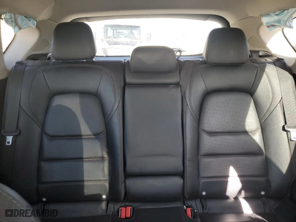 2021 Mazda CX-5 Grand Touring with VIN JM3KFBDM6M1348909, listed as a Copart auction lot 88581065 with 78,927 mi miles and Salvage Title. Bid and sale history available at carsss.com. Image 10.