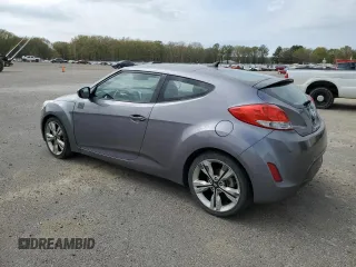 2016 Hyundai Veloster z VIN KMHTC6AD6GU263245, wystawiony jako Copart lot #51296685 z przebiegiem 132 889 mil mil oraz Szkoda całkowita • Salvage title. Historia ofert i sprzedaży dostępna na DreamBid. Obrazek 2.