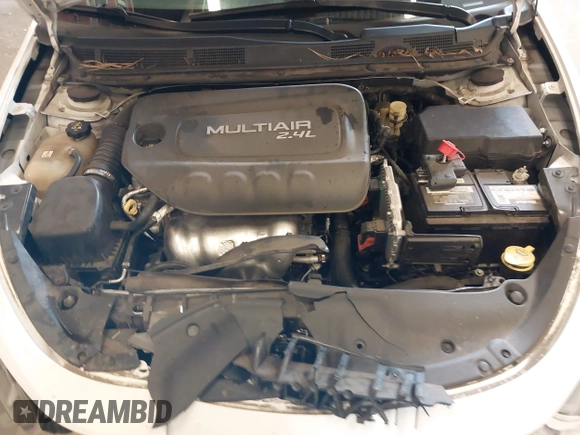 2015 Dodge Dart SXT with VIN 1C3CDFBB9FD319423, listed as a IAAI auction lot 41870324 with 124,857 mi miles. Bid and sale history available at carsss.com. Image 10.