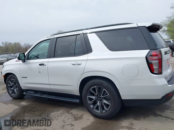 2021 Chevrolet Tahoe Z71 with VIN 1GNSKPKD6MR160422, listed as a IAAI auction lot 41920107 with 37,399 mi miles and . Bid and sale history available at DreamBid. Image 14.
