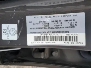 2019 Mazda 3 S Carbon Edition with VIN JM1BPBCM3K1123710, listed as a Copart auction lot 63765644 with 137,243 mi miles and Salvage title. Bid and sale history available at DreamBid. Image 12.
