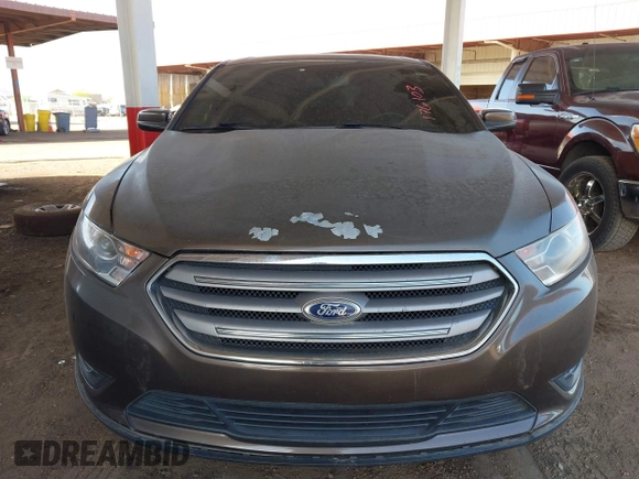 2015 Ford Taurus SEL with VIN 1FAHP2H87FG176103, listed as a IAAI auction lot 41950844 with 205,014 mi miles. Bid and sale history available at carsss.com. Image 6.