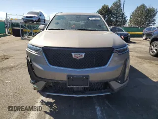 2023 Cadillac XT6 AWD Sport z VIN 1GYKPHRSXPZ181132, wystawiony jako Copart lot #50512825 z przebiegiem 17 302 mil mil oraz Szkody całkowita. Historia ofert i sprzedaży dostępna na DreamBid. Obrazek 5.