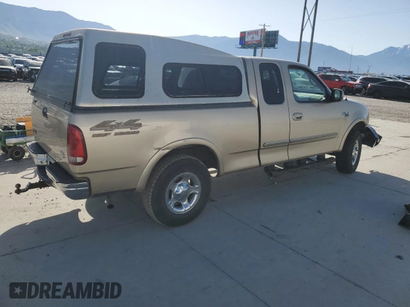 1999 Ford F-150 XL with VIN 1FTRX18L5XKA44484, listed as a Copart auction lot 56232815 with 177,990 mi miles and Salvage title. Bid and sale history available at DreamBid. Image 3.