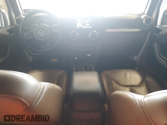 2015 Jeep Wrangler Unlimited Sahara с VIN 1C4HJWEG0FL560973, выставлен на аукционе Copart как лот 59552135 с пробегом 135 057 миль миль и Чистый • Clean title. История ставок и продаж доступна на DreamBid. Изображение 8.