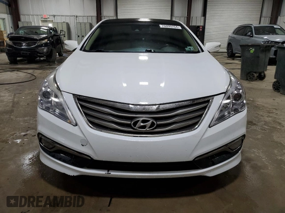 2015 Hyundai Azera Limited z VIN KMHFH4JG1FA448378, wystawiony jako Copart lot #76099764 z przebiegiem 117 489 mil mil oraz Szkoda całkowita • Salvage title. Historia ofert i sprzedaży dostępna na DreamBid. Obrazek 5.