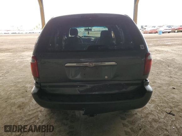 2006 Chrysler Town & Country with VIN 1A4GP45R46B713077, listed as a Copart auction lot 53140055 with 165,433 mi miles and Salvage Title. Bid and sale history available at DreamBid. Image 6.