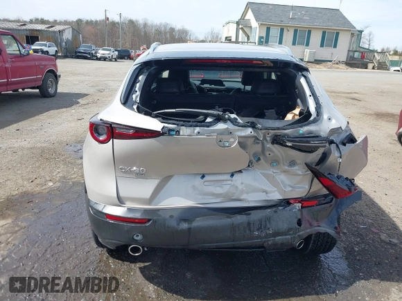 2022 Mazda CX-30 S Select with VIN 3MVDMBBL4NM401563, listed as a IAAI auction lot 41826878 with 4,733 mi miles and . Bid and sale history available at carsss.com. Image 16.