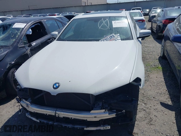 2018 BMW 5 Series 530i with VIN WBAJA5C54JWA39873, listed as a IAAI auction lot 41369709 with 66,353 mi miles and . Bid and sale history available at DreamBid. Image 12.