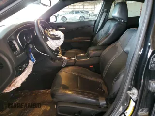 2015 Dodge Charger SXT with VIN 2C3CDXJG9FH748809, listed as a Copart auction lot 61682335 with 128,252 mi miles and Salvage title. Bid and sale history available at DreamBid. Image 7.