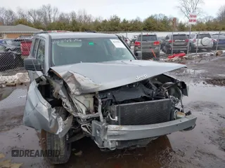 2015 Jeep Patriot Latitude z VIN 1C4NJRFB7FD412238, wystawiony jako IAAI lot #41639976 z przebiegiem 106 767 mil mil oraz . Historia ofert i sprzedaży dostępna na DreamBid. Obrazek 1.