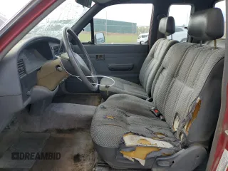 1992 Toyota Pickup DLX z VIN JT4RN93P1N5052818, wystawiony jako Copart lot #77344244 z przebiegiem 484 357 mil mil oraz Szkoda całkowita • Salvage title. Historia ofert i sprzedaży dostępna na DreamBid. Obrazek 7.