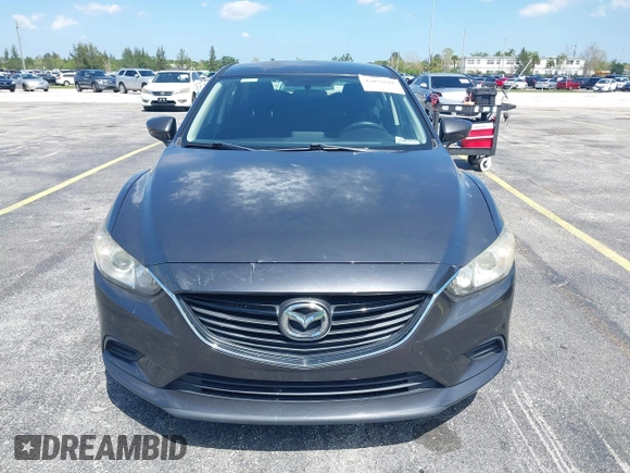 2016 Mazda Mazda6 i Sport with VIN JM1GJ1U5XG1482164, listed as a IAAI auction lot 42052618 with 79,630 mi miles. Bid and sale history available at carsss.com. Image 6.